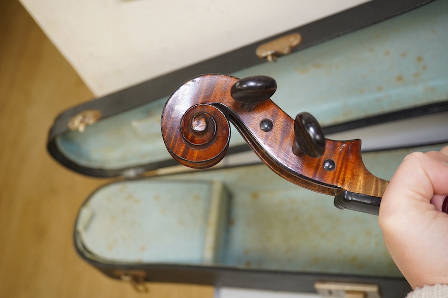 A late 19th century French Chipot-Vuillaume violin, with Edward Withers case, back measures 36cm.